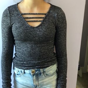 Long sleeved v neck cut out shirt